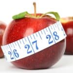 Picture of an apple with a measuring tape